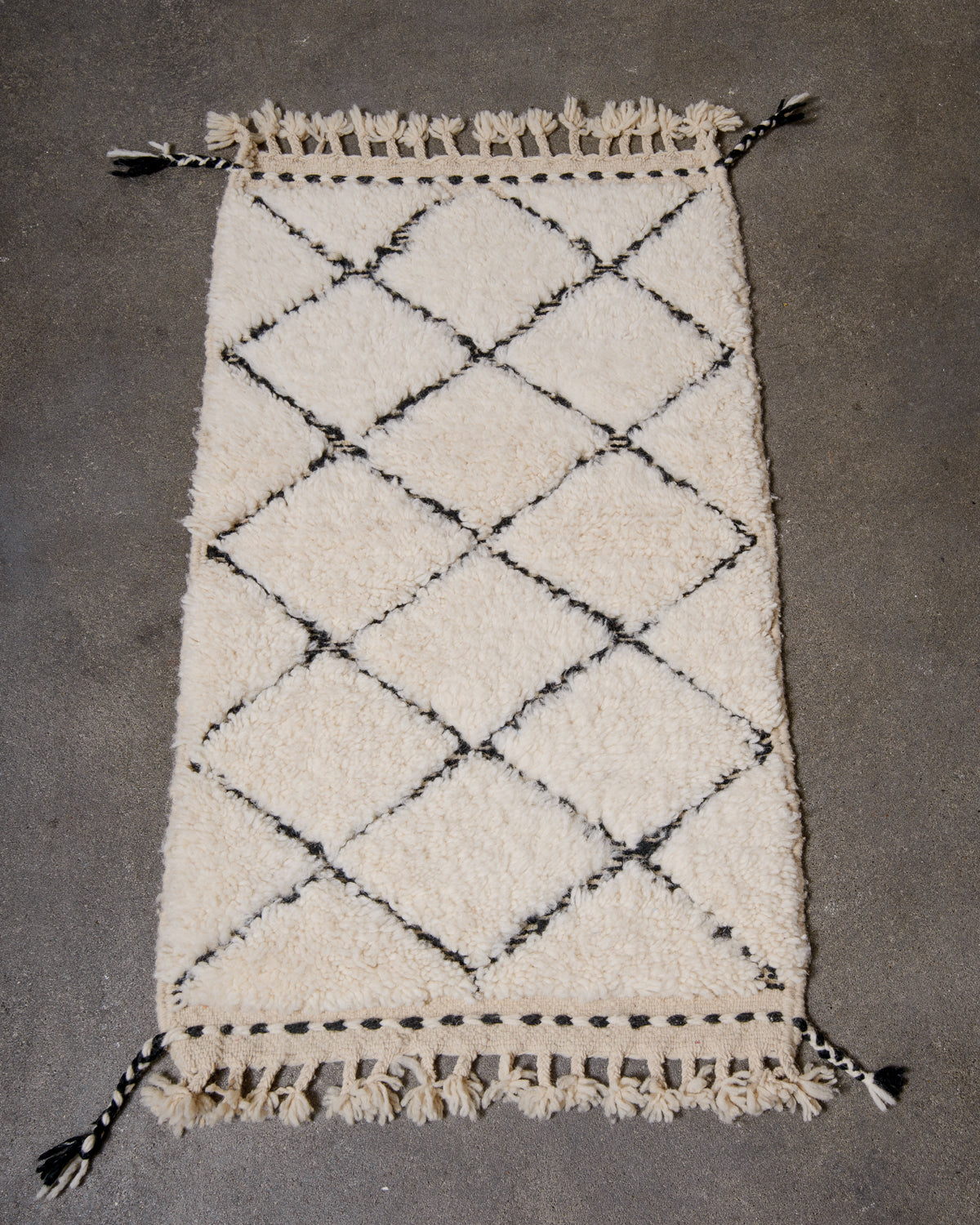 Modern, designer, handcrafted Berber rug from Morocco. Beniourain carpet with beautiful colours and patterns and fluffy wool texture.